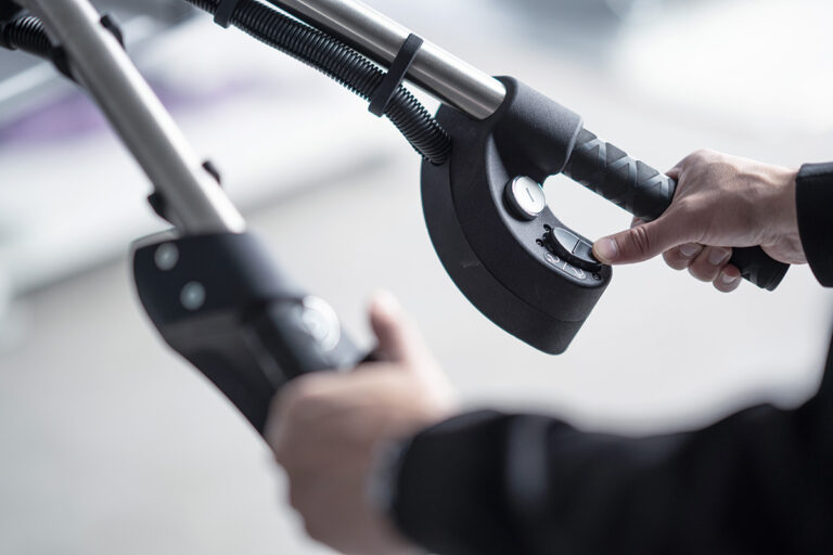Ergonomic control handle with thumb joystick on Mechtool Panel 60 Tilt vacuum lifter